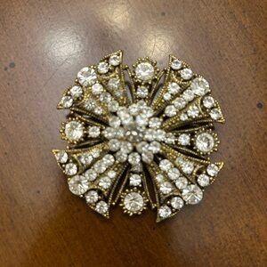 Vintage rhinestone starburst brooch. Gold and Silver.